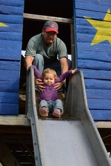 daddy helping on the slide